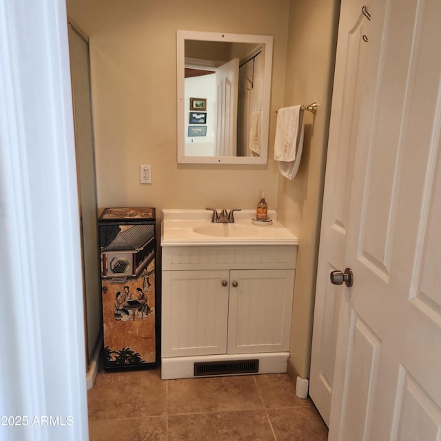 bathroom with vanity and tile patterned flooring