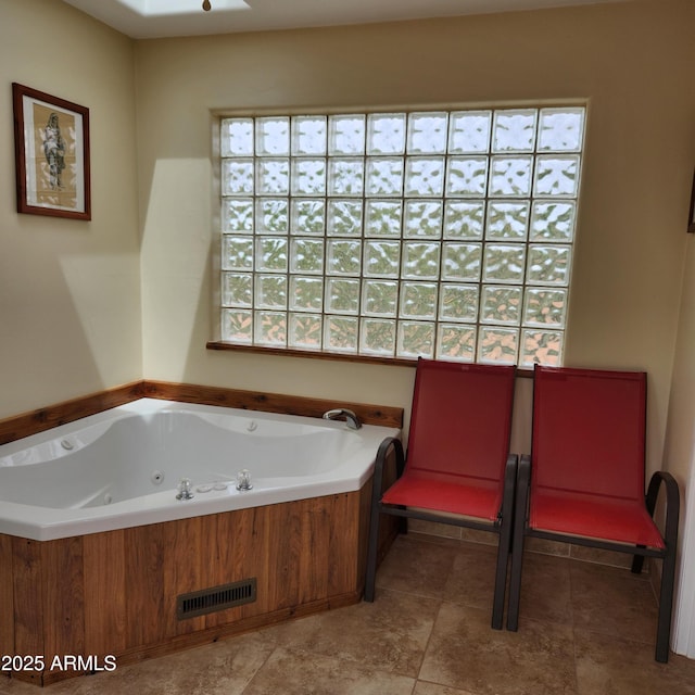 bathroom featuring a whirlpool tub