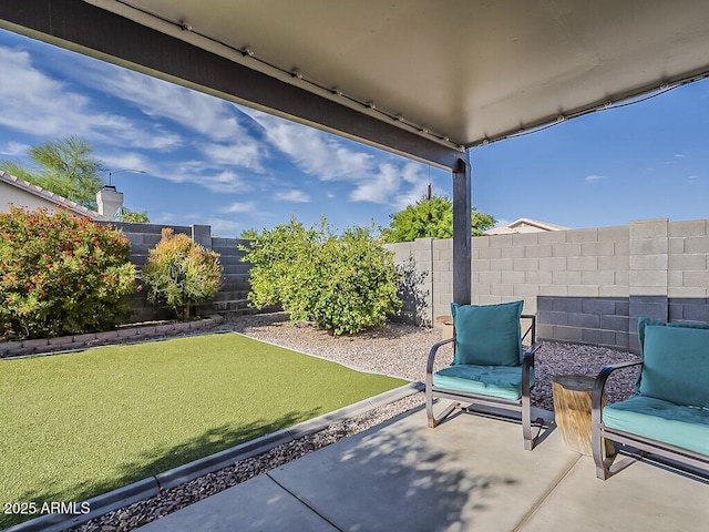 view of patio with a fenced backyard