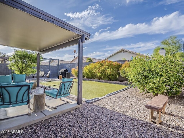 view of patio / terrace featuring an outdoor hangout area and a fenced backyard