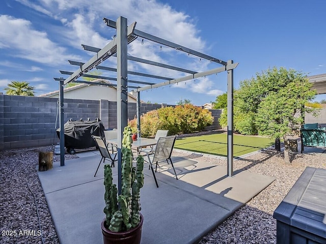 view of patio / terrace with a pergola and a fenced backyard