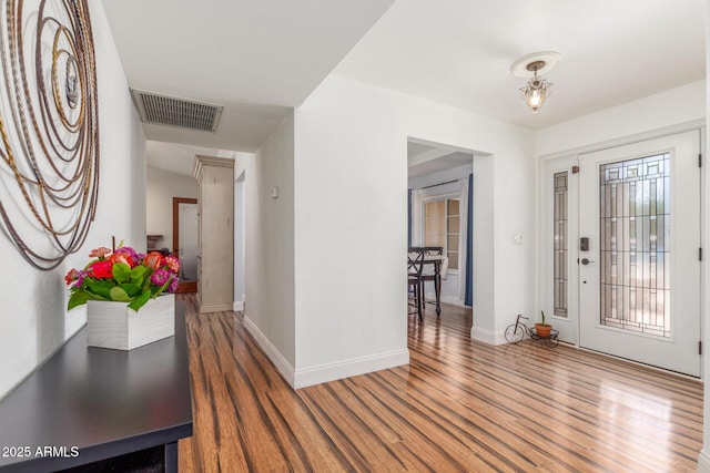 15825 N 45th St, Phoenix, AZ 85032 - foyer entrance featuring wood finished floors and baseboards