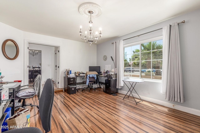 15825 N 45th St, Phoenix, AZ 85032 - office area with a chandelier, wood finished floors, and baseboards