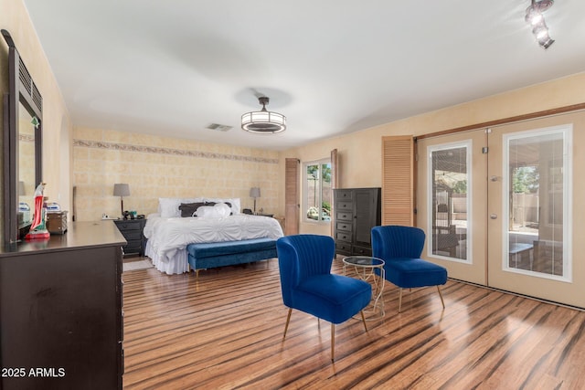 15825 N 45th St, Phoenix, AZ 85032 - bedroom featuring french doors, access to outside, and wood finished floors