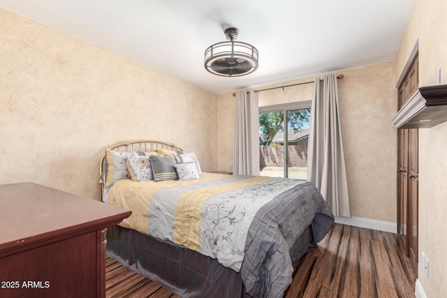 15825 N 45th St, Phoenix, AZ 85032 - bedroom featuring wood finished floors, access to outside, a textured wall, and baseboards