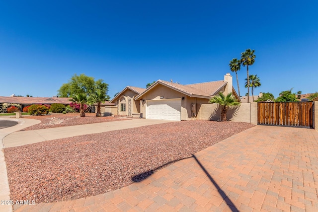 15825 N 45th St, Phoenix, AZ 85032 - single story home featuring stucco siding, concrete driveway, a garage, a chimney, and a tile roof