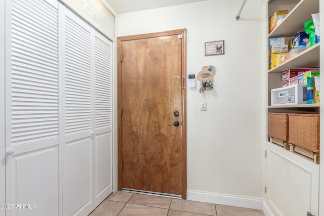 15825 N 45th St, Phoenix, AZ 85032 - entryway featuring light tile patterned floors and baseboards
