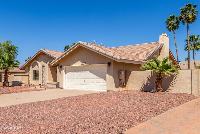 15825 N 45th St, Phoenix, AZ 85032 - view of front of home with stucco siding, a garage, concrete driveway, a chimney, and a tile roof
