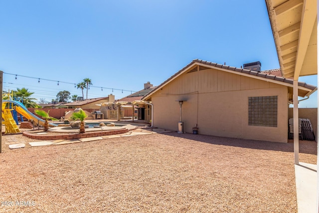 15825 N 45th St, Phoenix, AZ 85032 - view of yard with a playground, a patio area, and a pool