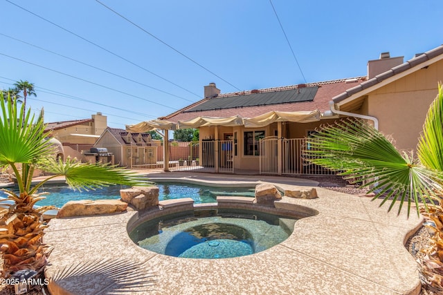 15825 N 45th St, Phoenix, AZ 85032 - view of swimming pool with a pool with connected hot tub and a fenced backyard