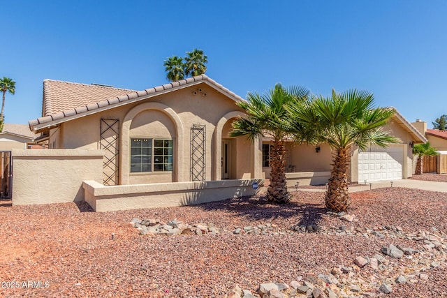 15825 N 45th St, Phoenix, AZ 85032 - mediterranean / spanish-style house featuring stucco siding, a garage, concrete driveway, and a tiled roof