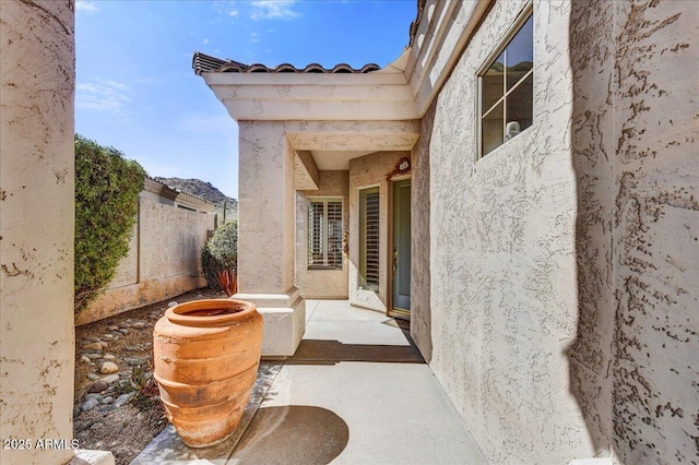 view of patio / terrace featuring fence