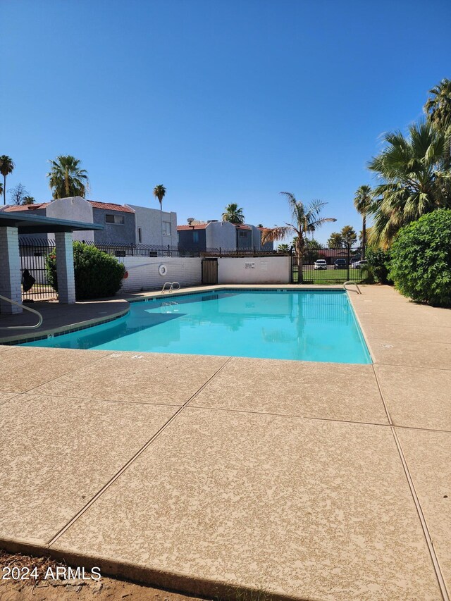 view of swimming pool featuring a patio