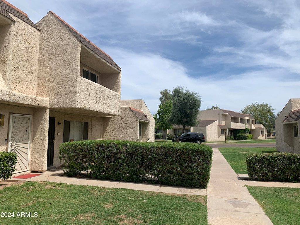 view of community with a yard