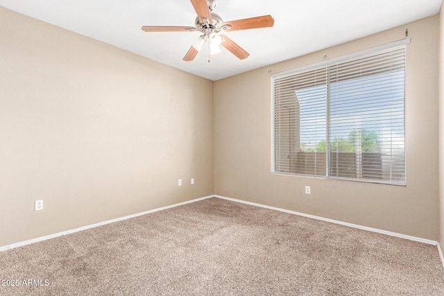 2134 E Broadway Rd Unit 2030, Tempe, AZ 85282 - spare room with carpet flooring, baseboards, and a ceiling fan