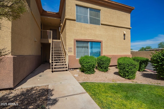 2134 E Broadway Rd Unit 2030, Tempe, AZ 85282 - view of exterior entry featuring stucco siding