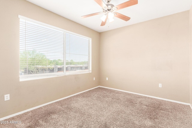 2134 E Broadway Rd Unit 2030, Tempe, AZ 85282 - unfurnished room featuring healthy amount of natural light, carpet, a ceiling fan, and baseboards