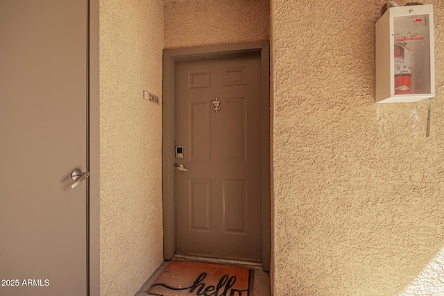 2134 E Broadway Rd Unit 2030, Tempe, AZ 85282 - doorway to property with stucco siding