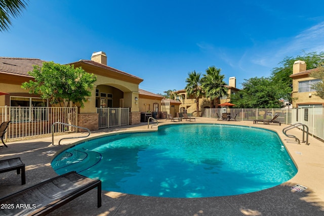 2134 E Broadway Rd Unit 2030, Tempe, AZ 85282 - community pool featuring a patio area