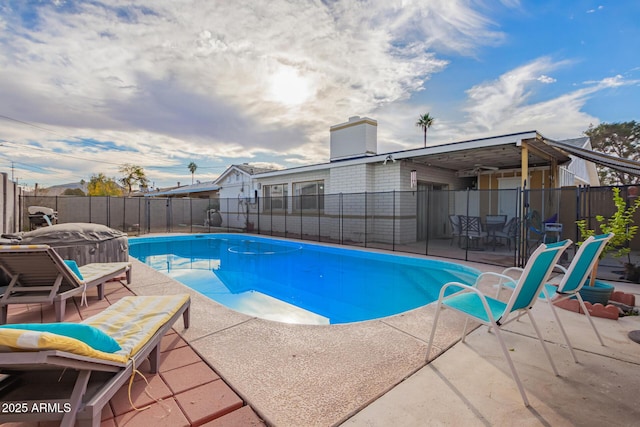 view of pool featuring a patio area