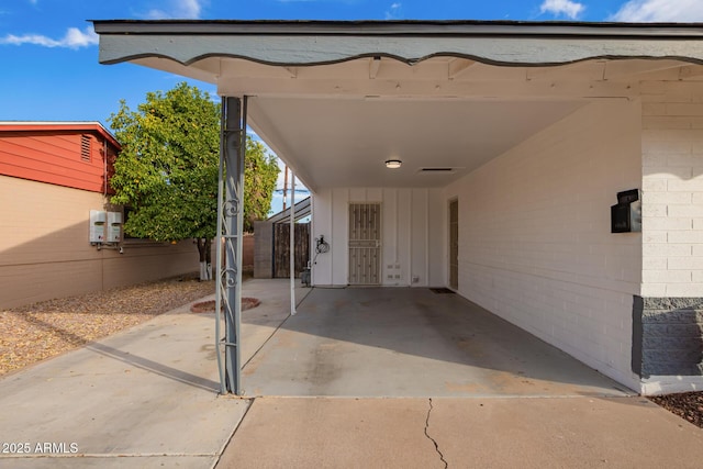 view of patio / terrace featuring a carport