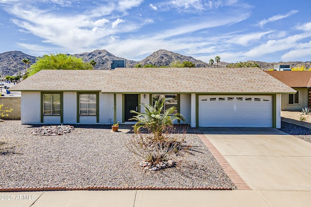 11210 S Bannock St, Phoenix, AZ 85044 - ranch-style house with a garage, a mountain view, and concrete driveway