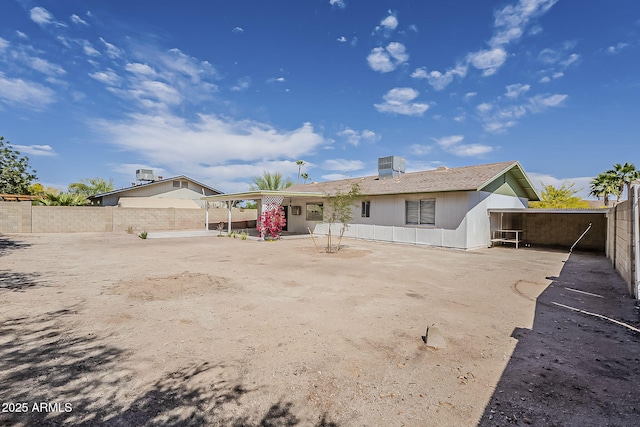 11210 S Bannock St, Phoenix, AZ 85044 - rear view of house featuring a fenced backyard and a patio area