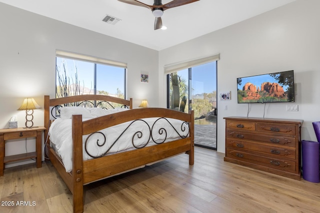 bedroom with ceiling fan, light hardwood / wood-style floors, and access to outside