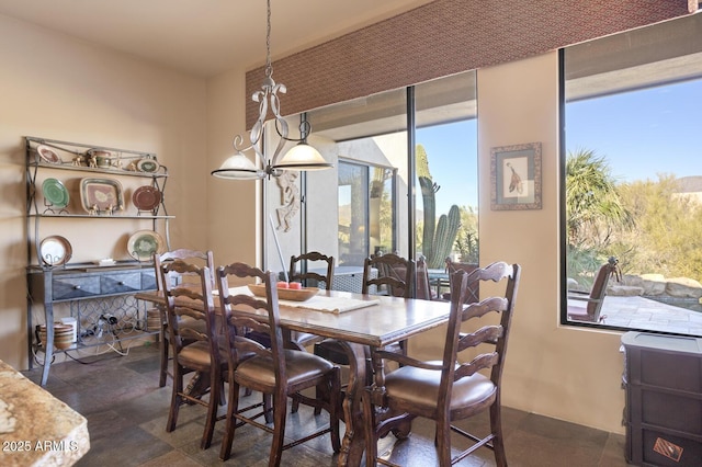 dining area with a chandelier