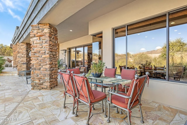 view of patio / terrace with a mountain view