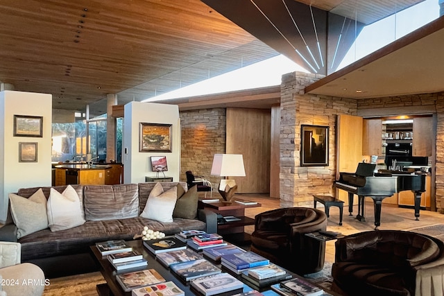 interior space with light hardwood / wood-style flooring, wooden ceiling, and vaulted ceiling