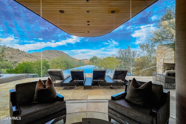 view of patio / terrace featuring a mountain view