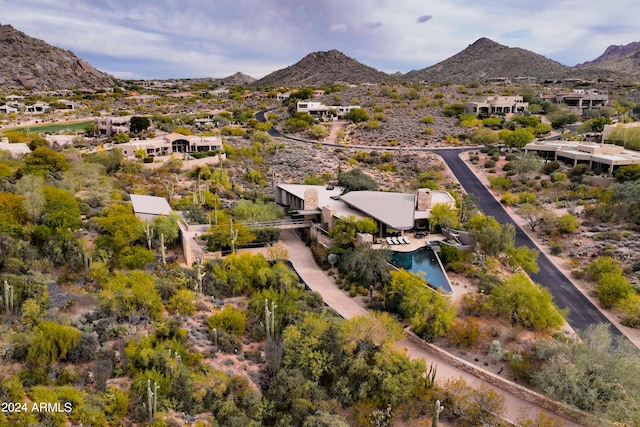 drone / aerial view featuring a mountain view