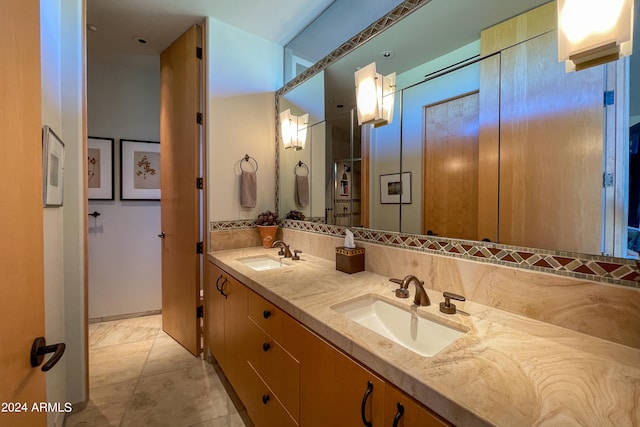 bathroom featuring vanity and tile patterned flooring