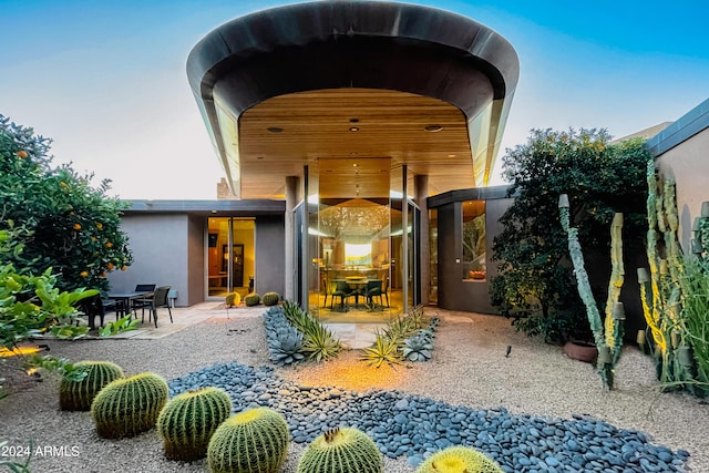 rear view of house featuring a patio