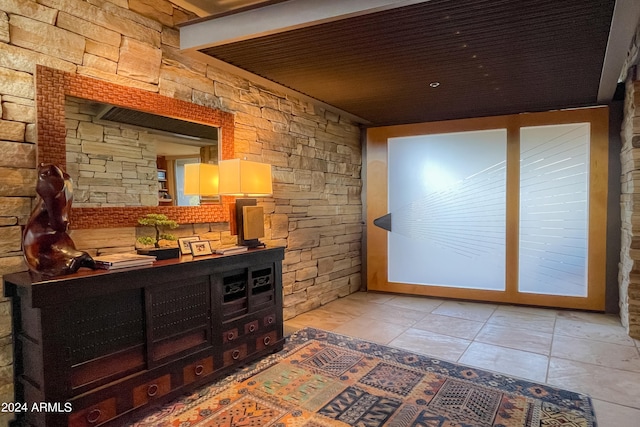 interior space with light tile patterned floors