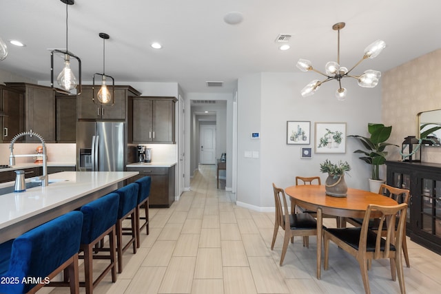 24226 N 22nd St, Phoenix, AZ 85024 - dining area featuring baseboards, a chandelier, and recessed lighting