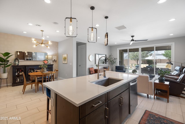 24226 N 22nd St, Phoenix, AZ 85024 - kitchen with open floor plan, a sink, recessed lighting, light countertops, and stainless steel dishwasher