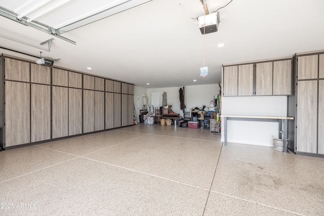 24226 N 22nd St, Phoenix, AZ 85024 - garage featuring a garage door opener and recessed lighting