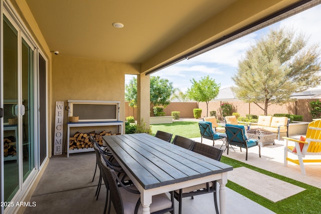 24226 N 22nd St, Phoenix, AZ 85024 - fenced backyard featuring a patio area, an outdoor living space with a fire pit, and outdoor dining area
