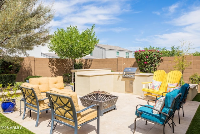 24226 N 22nd St, Phoenix, AZ 85024 - fenced backyard featuring an outdoor living space with a fire pit and a patio