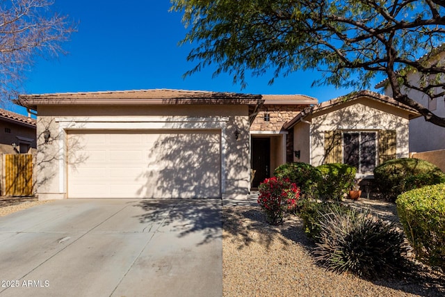 single story home featuring a garage