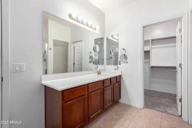 bathroom featuring vanity and tile patterned flooring