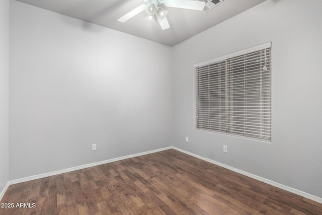 spare room featuring ceiling fan and wood-type flooring