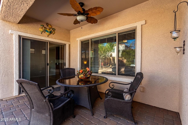 view of patio with ceiling fan