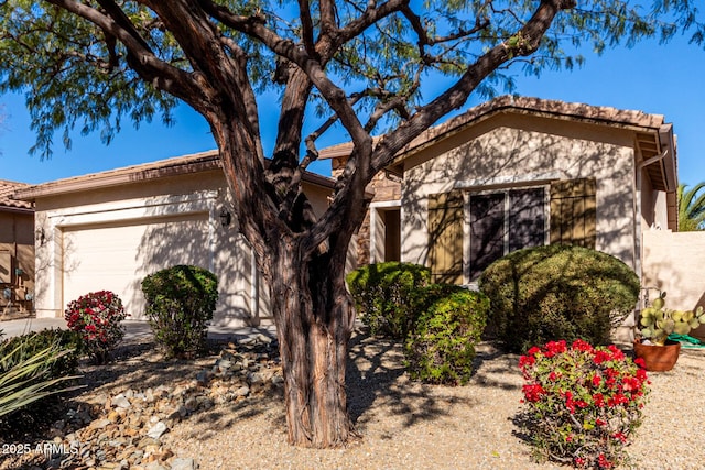 view of front of property featuring a garage