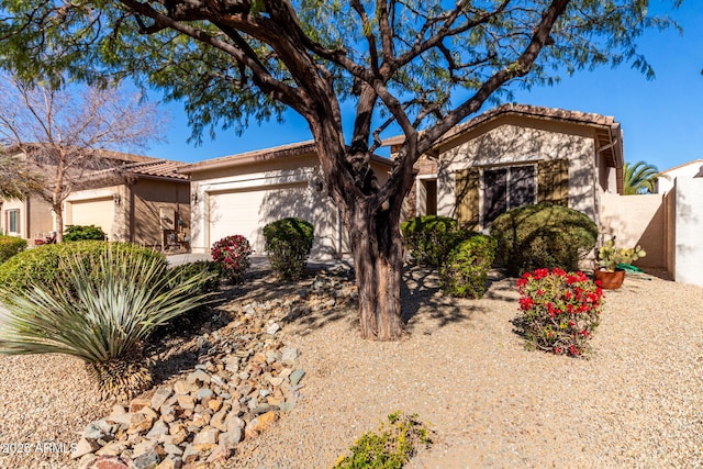 view of front of property featuring a garage