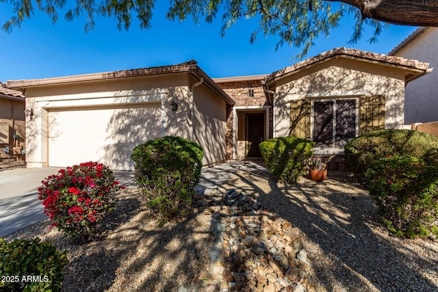 ranch-style home featuring a garage