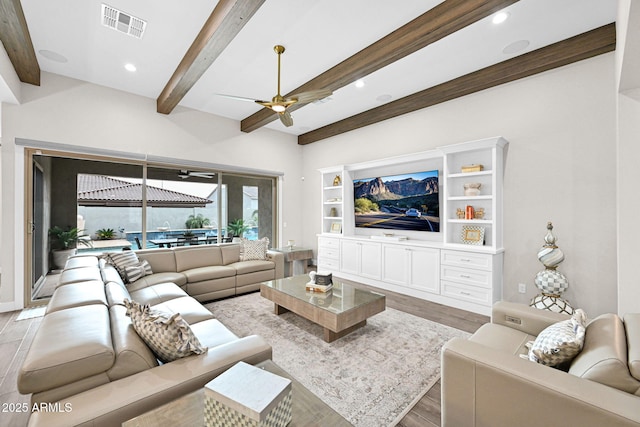 living room with recessed lighting, visible vents, a ceiling fan, wood finished floors, and beamed ceiling