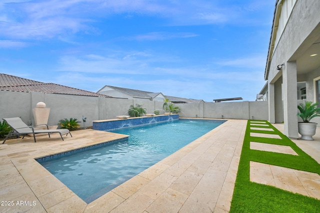 view of pool featuring a fenced backyard, a fenced in pool, and a patio